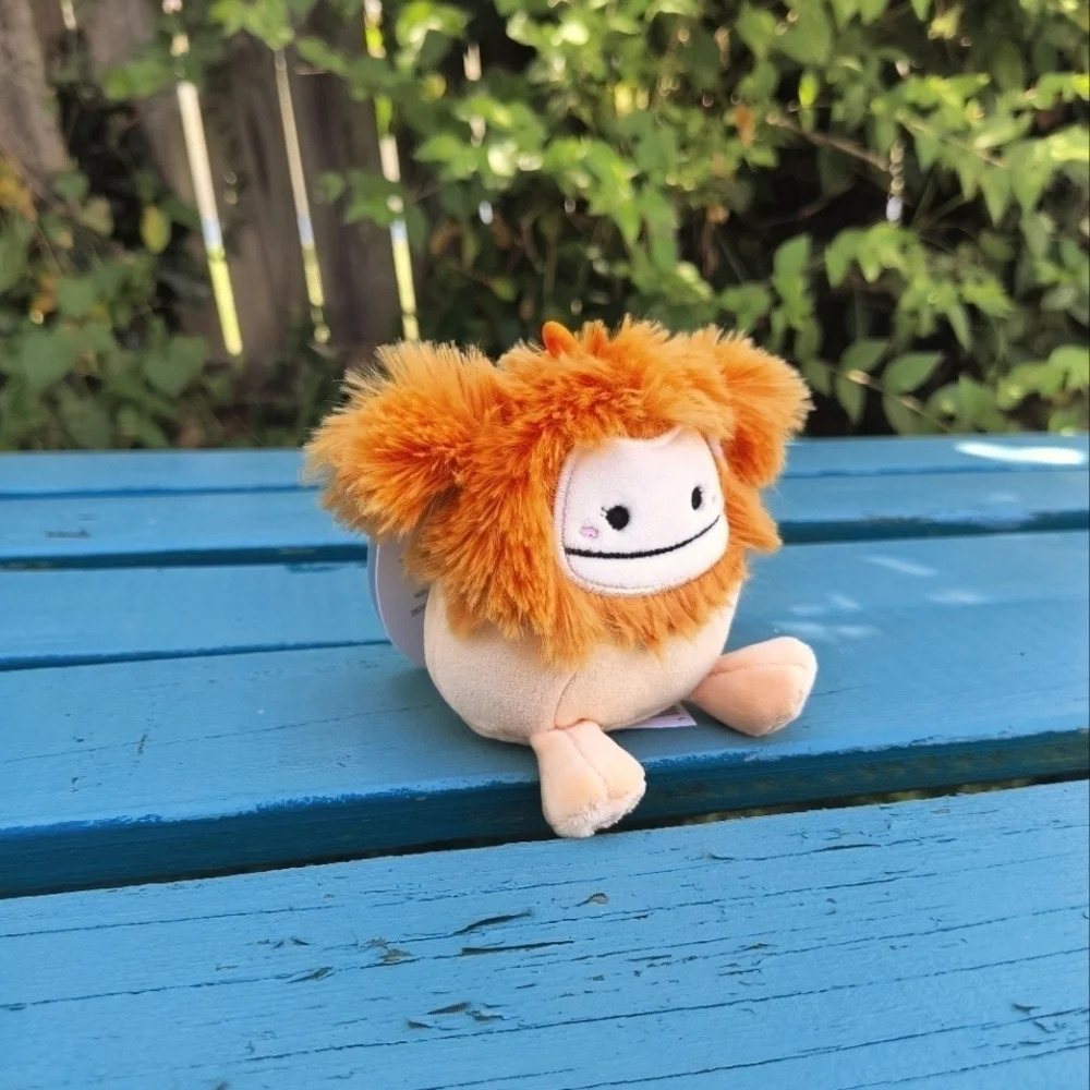 Squishmallow Shasta The Bigfoot Peach Flower Clip plushie kids orange floral bag
